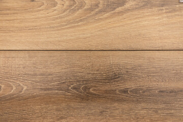 Wooden surface with natural grain detail in warm tones creating a cozy atmosphere for interior design