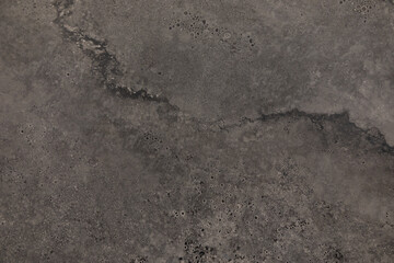 Textured gray surface with intricate patterns and natural irregularities in various shades