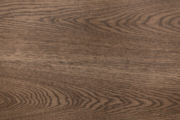 Natural wooden surface displays rich grain patterns and textures found in modern interior design...