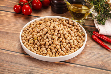 Dry chickpea seeds heap in the bowl