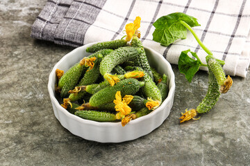 Raw gherkin cucumbers in the bowl