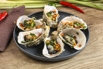 Baked oysters with green onion