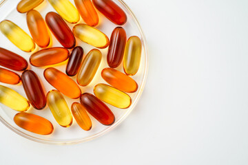 Vitamins capsules, fish oil, soft gels, supplements, omega 3, omega 9, vitamin D, vitamin E