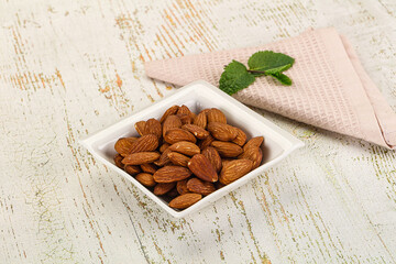 Tasty ripe almond nuts heap