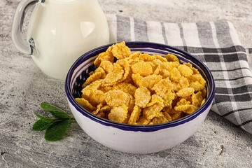Corn flakes with milk for breakfast