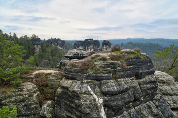 Majestic rocky landscape with a sweeping view of the wooded valley. Nature photo