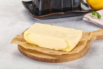 Dairy butter piece over board