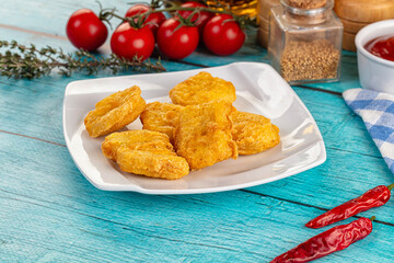 Golden crispy fried chicken nuggets
