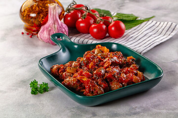 Roasted chicken hearts with vegetables