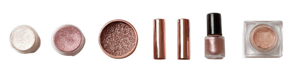 Assorted cosmetic products in light mauve and rose tones