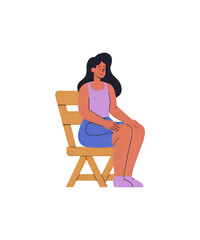 young woman sitting on chair