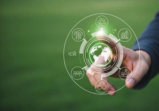 Innovative sustainable business solutions visualized through a digital interface connecting global impact, community, and environmental progress with a hand interacting. - Powered by Adobe