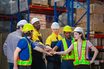 Diverse warehouse team joins hands before starting work, reflecting unity, encouragement, and mutual goals. Perfect image for corporate team building, HR, and internal communications.