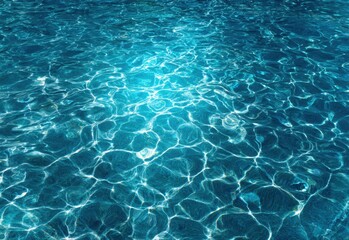 Obraz premium Experience the mesmerizing beauty of crystal-clear water, where sunlight dances on the surface, creating an enchanting tapestry of light and tranquility in a serene aquatic environment.