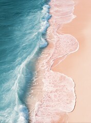 Aerial view of turquoise and pastel pink beach waves