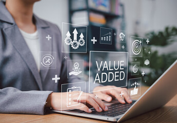 Business Value Added Concept. Increase worth of product or service. Businesswoman using laptop with...
