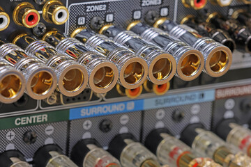 Rear panel of a high-quality AV receiver with multimedia connections for connecting speakers,...