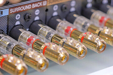 Rear panel of a high-quality AV receiver with multimedia connections for connecting speakers,...