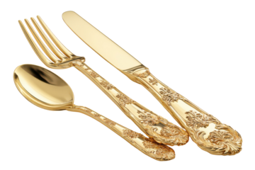 Elegant gold cutlery set featuring a knife fork and spoon with intricate floral designs for fine dining
