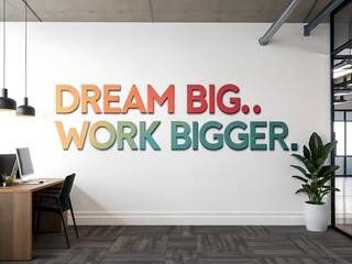 Inspirational dream big work bigger quote painted on a modern office wall with desk and plant