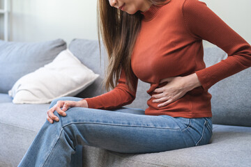 Flatulence ulcer, asian young woman, girl hands in belly, stomach pain from food poisoning, abdominal pain and digestive problem, gastritis or diarrhea. Abdomen inflammation, menstrual period people.