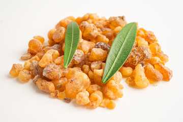 Frankincense or olibanum aromatic resin isolated on white background used in incense and perfumes.