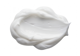 A blob of white cosmetic cream with a smooth texture is isolated on a transparent