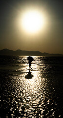  A collection of serene and atmospheric seascape photos from a Korean beach at dusk.

