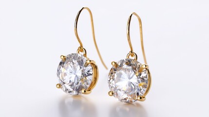 Gold earrings with large sparkling diamonds isolated on white background, luxury jewelry accessory