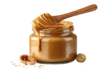 Creamy delight Indulge in the smoothness of peanut butter with a wooden spoon and whole peanuts