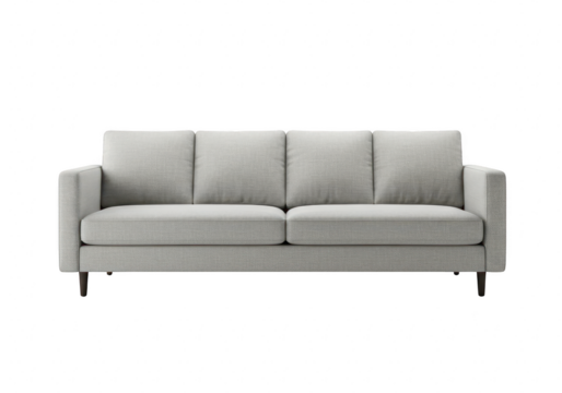 A modern gray sofa with cushions is isolated on a transparent background in a studio