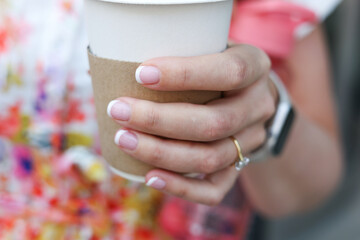 woman holding a cup of coffee