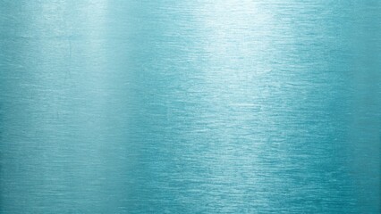 A light blue metallic background showcases a smooth brushed texture with subtle horizontal lines and a modern aesthetic
