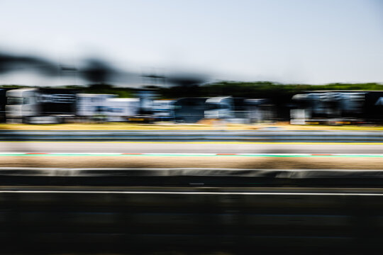 Race track, circuit panning, side view