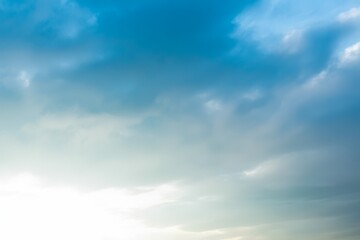 Fototapeta premium Blue sky with scattered clouds white atmospheric