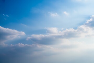 Blue sky with white and grey clouds image