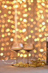 Sparkling Champagne Glasses with Bokeh Lights