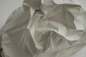 Obraz premium Crushed pale fabric texture white crumpled