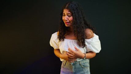 Heartbroken pensive woman sobs quietly into pain