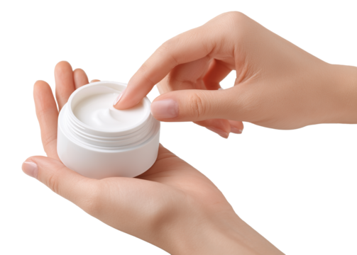 Moisturizer jar open beside hands applying lotion