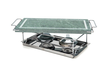 Modern kitchen with ceramic griddle, stainless steel utensils, and sleek appliances for cooking.