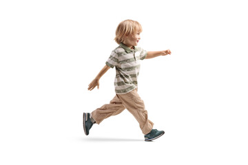 Full length profile shot of a cute little boy running