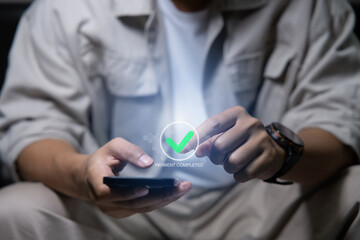 Digital banking network, internet payment, financial technology or FinTech concept. Businessman using smartphone with icons on virtual screen, online shopping and payment via mobile banking apps 