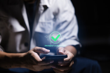 Digital banking network, internet payment, financial technology or FinTech concept. Businessman using smartphone with icons on virtual screen, online shopping and payment via mobile banking apps 