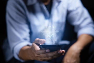 Digital banking network, internet payment, financial technology or FinTech concept. Businessman using smartphone with icons on virtual screen, online shopping and payment via mobile banking apps 