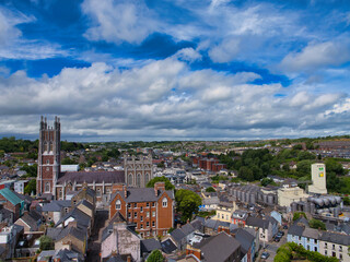 A breathtaking view of Cork's skyline captured from Shandon Tower, with historic architecture against a dramatic sky.
