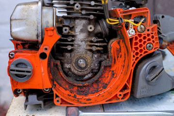 Photo of dirty chainsaw engine