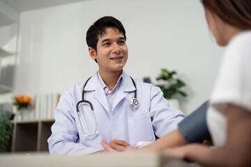 Healthcare. Doctor smiling and engaging with patient during consultation.