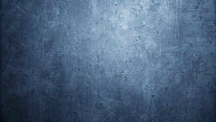 Fototapeta premium A dark blue metal surface full frame displaying a scratched texture perfect for backgrounds and industrial designs