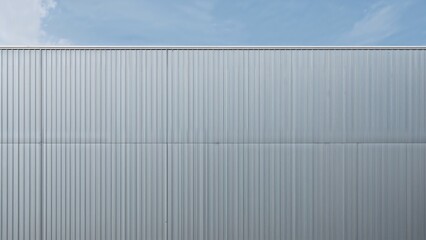 Fototapeta premium Steel-Surfaced Factory Architecture Under Bright Blue Sky